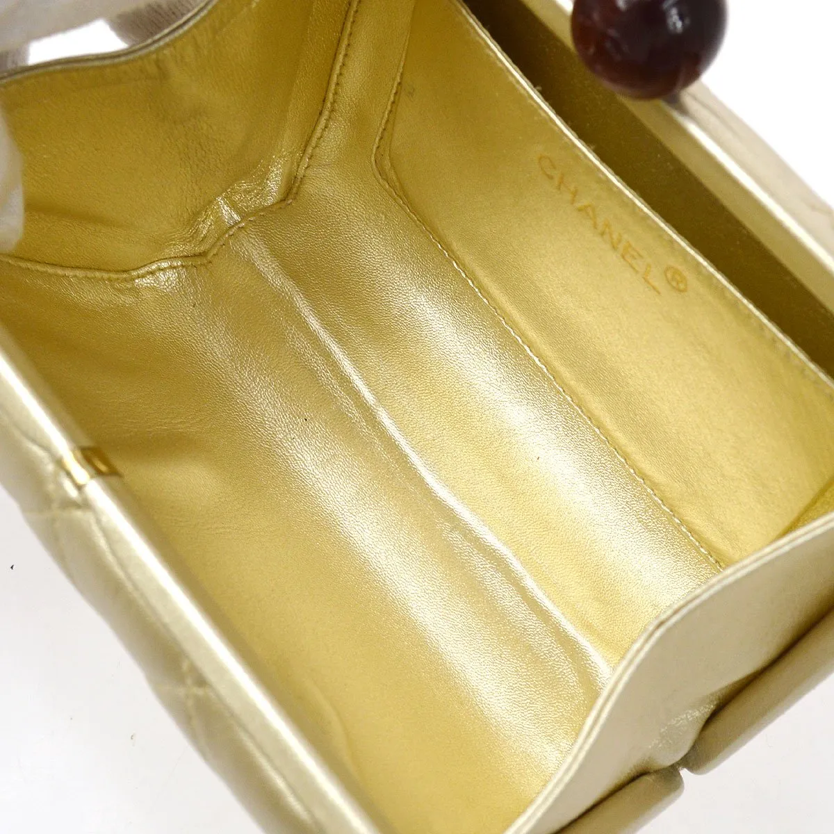CHANEL 1996-1997 Gold Lambskin Kisslock Handbag