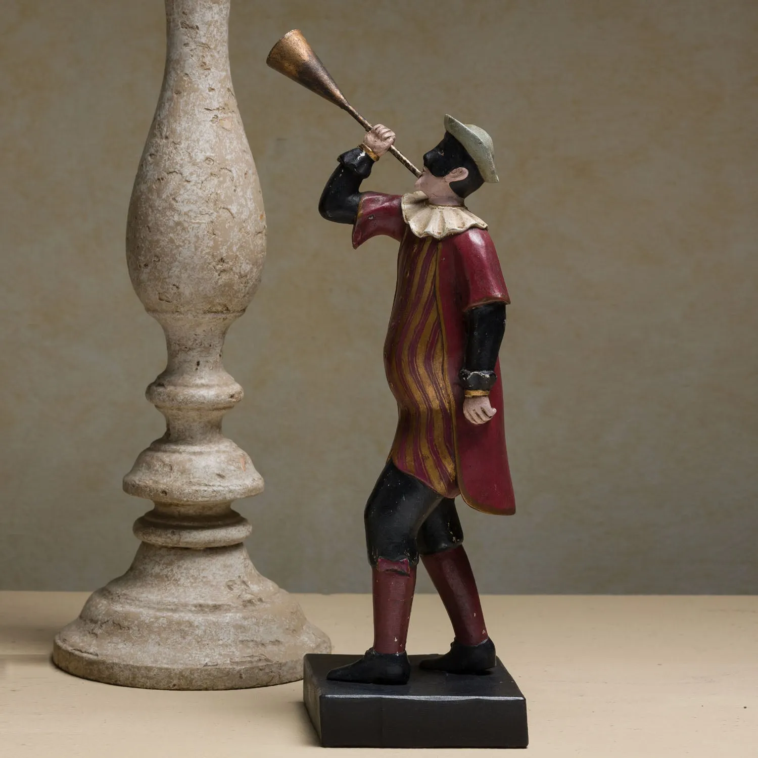 HARLEQUIN WITH TRUMPET
