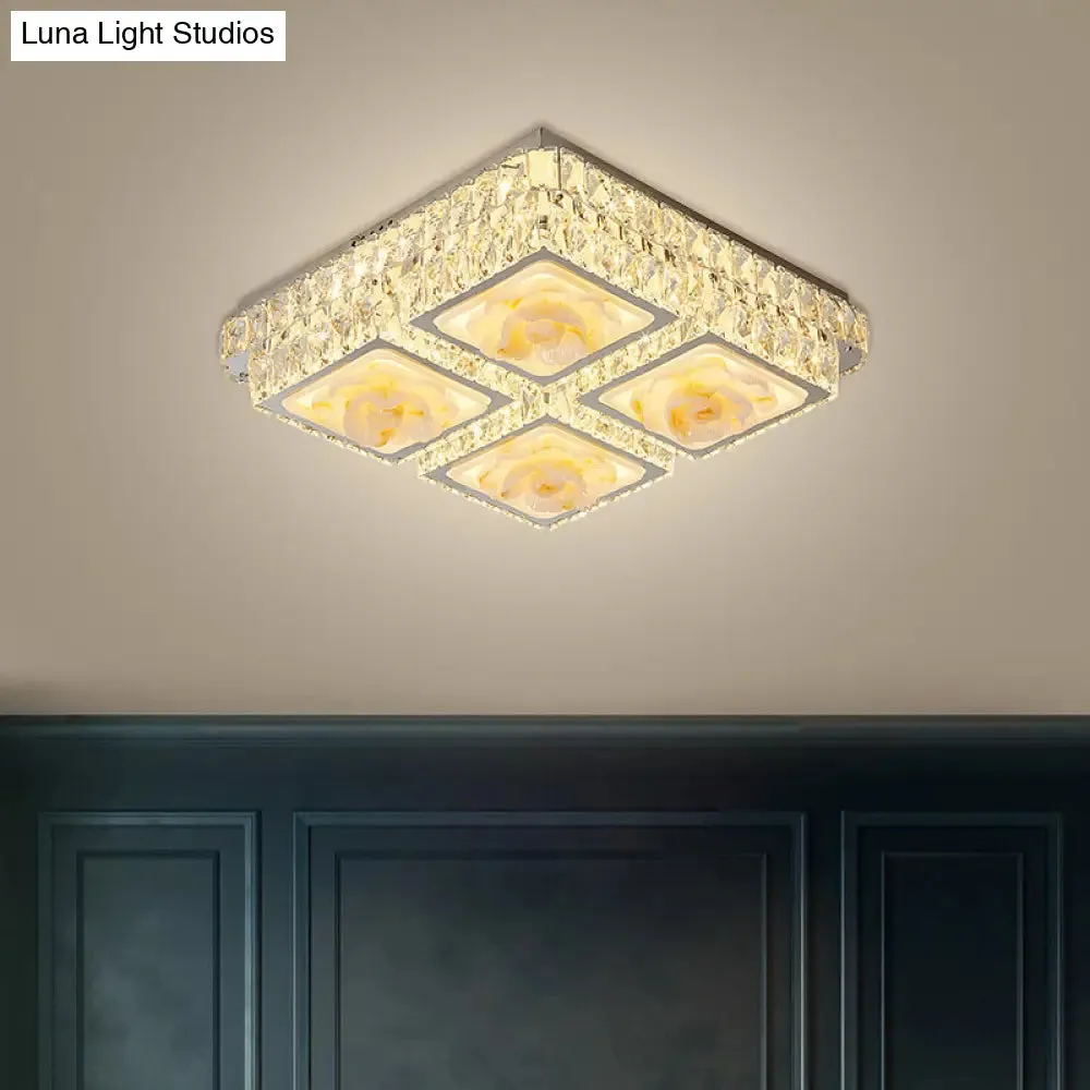Here are a few options: 

1. "Minimalist LED Crystal Ceiling Light with Jade Lotus Design" 
2. "Chrome Flush Mount with Crystal Blocks & LED Square Lights" 
3. "Contemporary Crystal Flush Light with Jade Lotus Detail