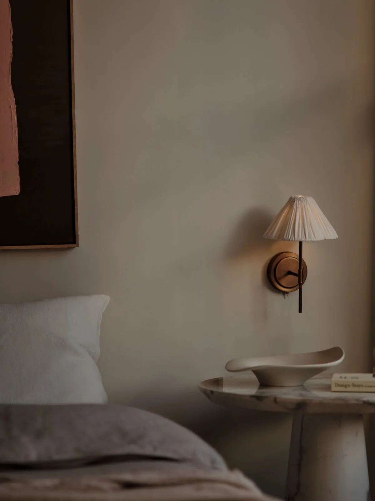 Lindi - aged brass and linen scalloped wall light