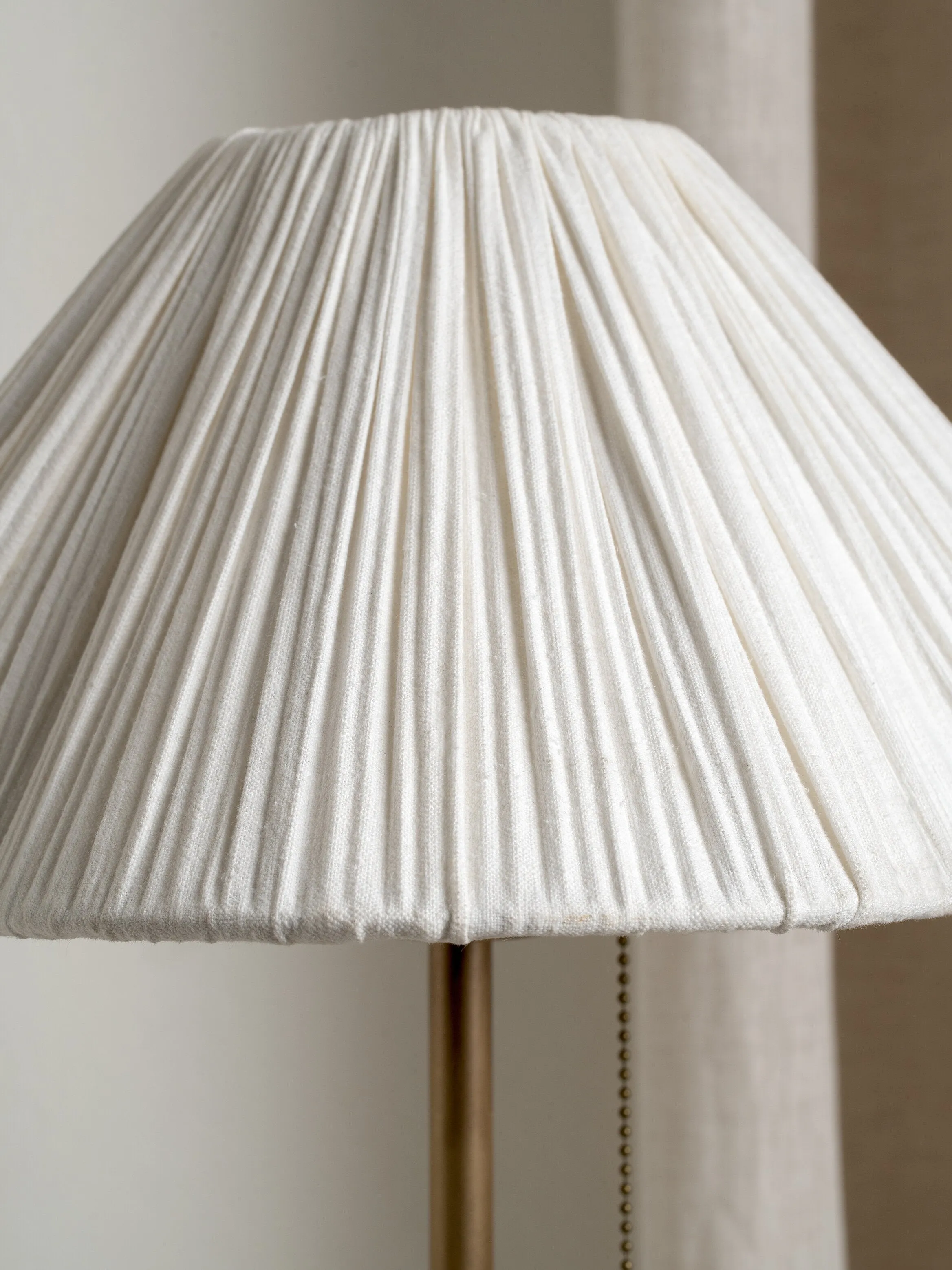 Lindi - aged brass and scalloped linen table lamp